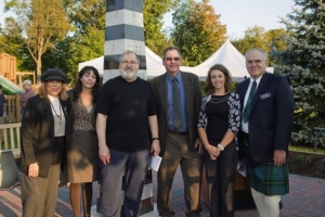 Historical Commission and artist David Barr in front of Baseline Marker